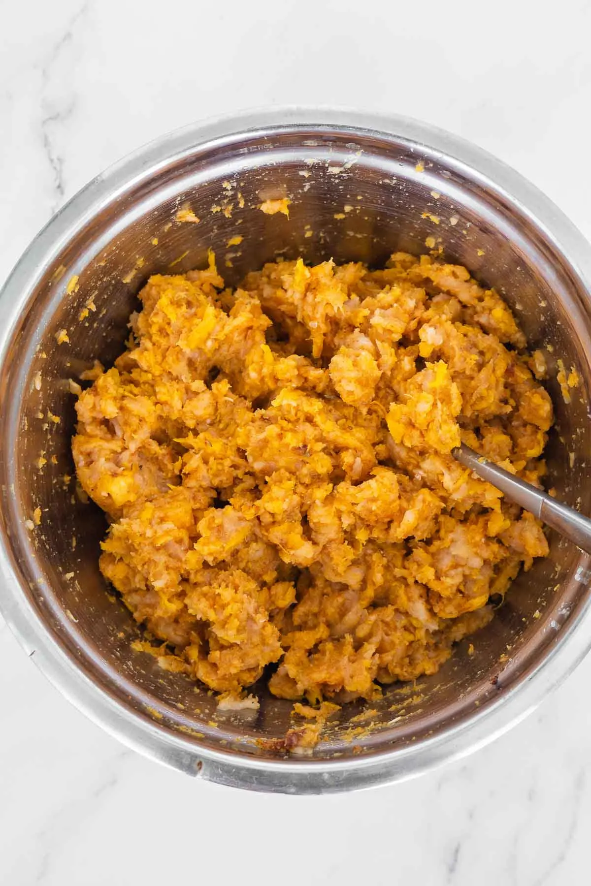 Mixture to make sweet potato chicken nuggets in a bowl.