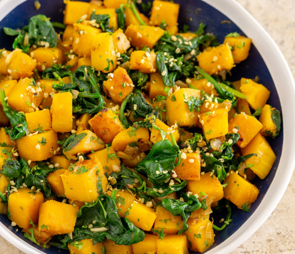 butternut squash and spinach on a plate