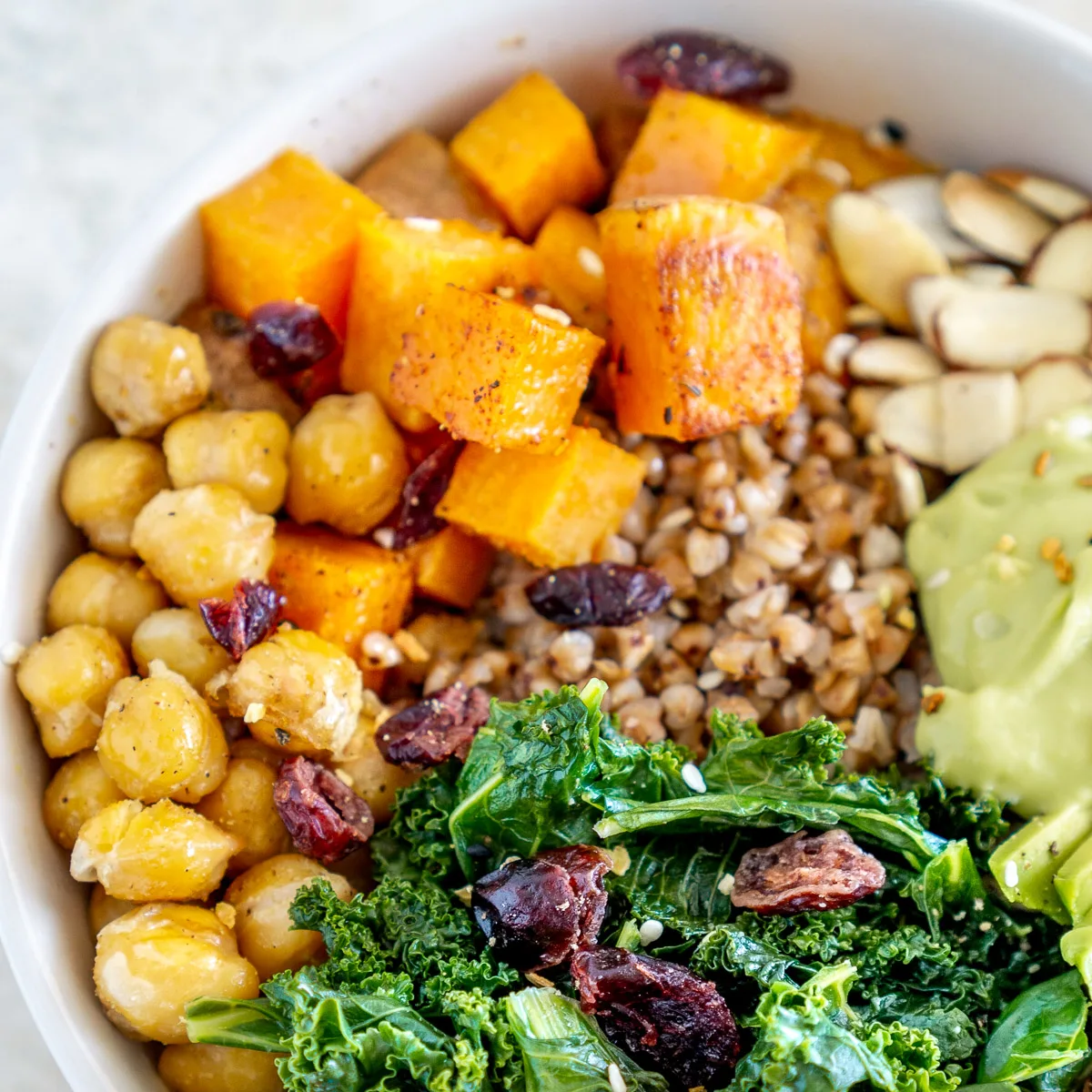 close up of buckwheat bowl with sweet potato, chickpeas and kale