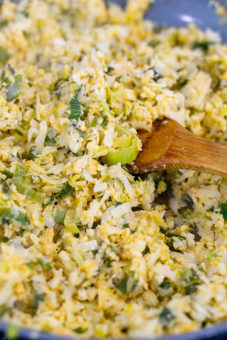 cooking cheesy cauliflower risotto with leeks