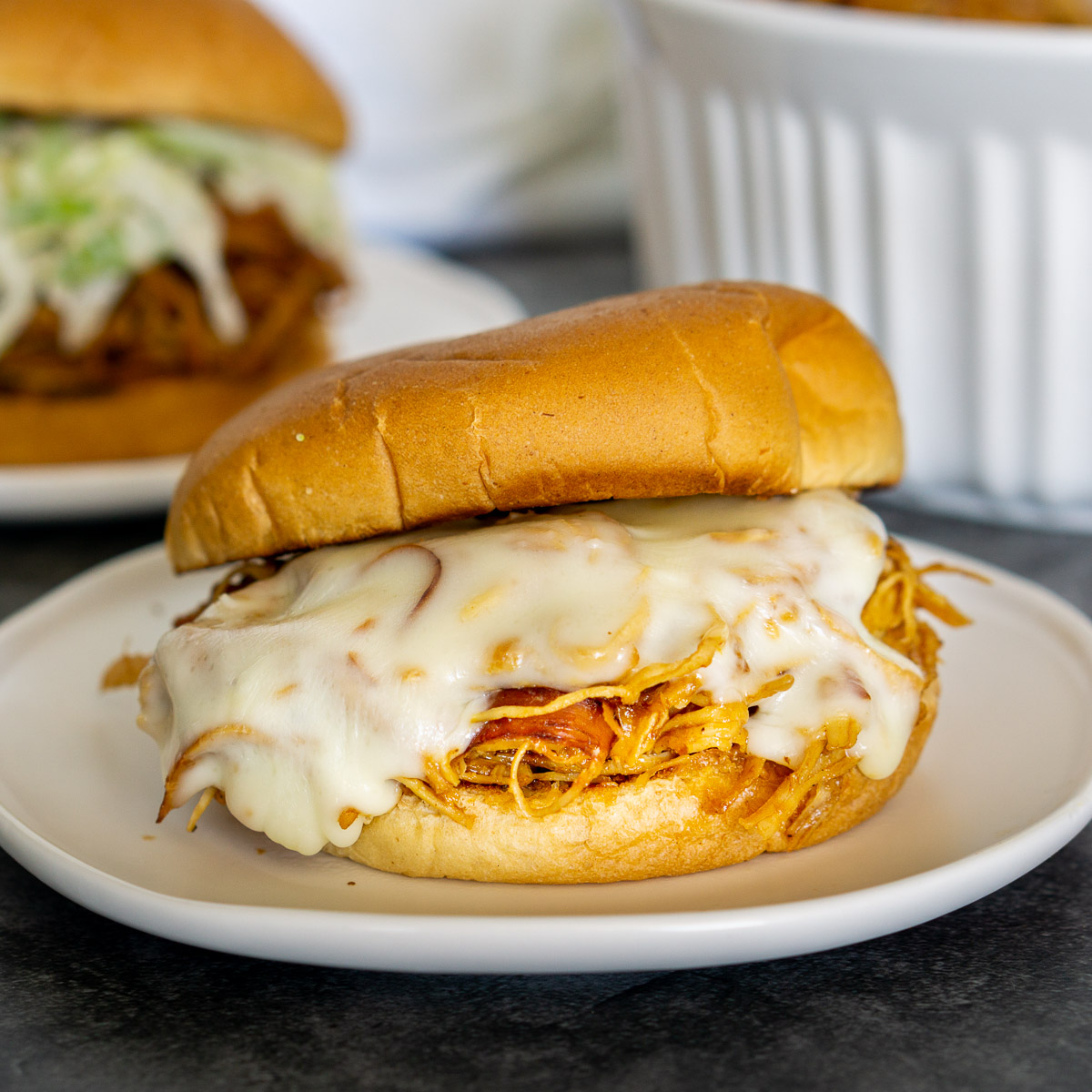 BBQ pulled chicken sandwich with melted cheese