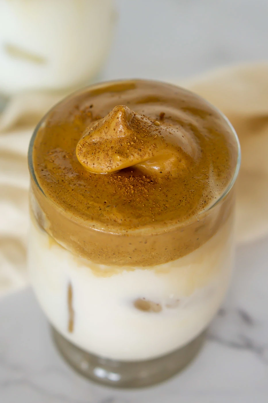 pumpkin spice whipped coffee over ice