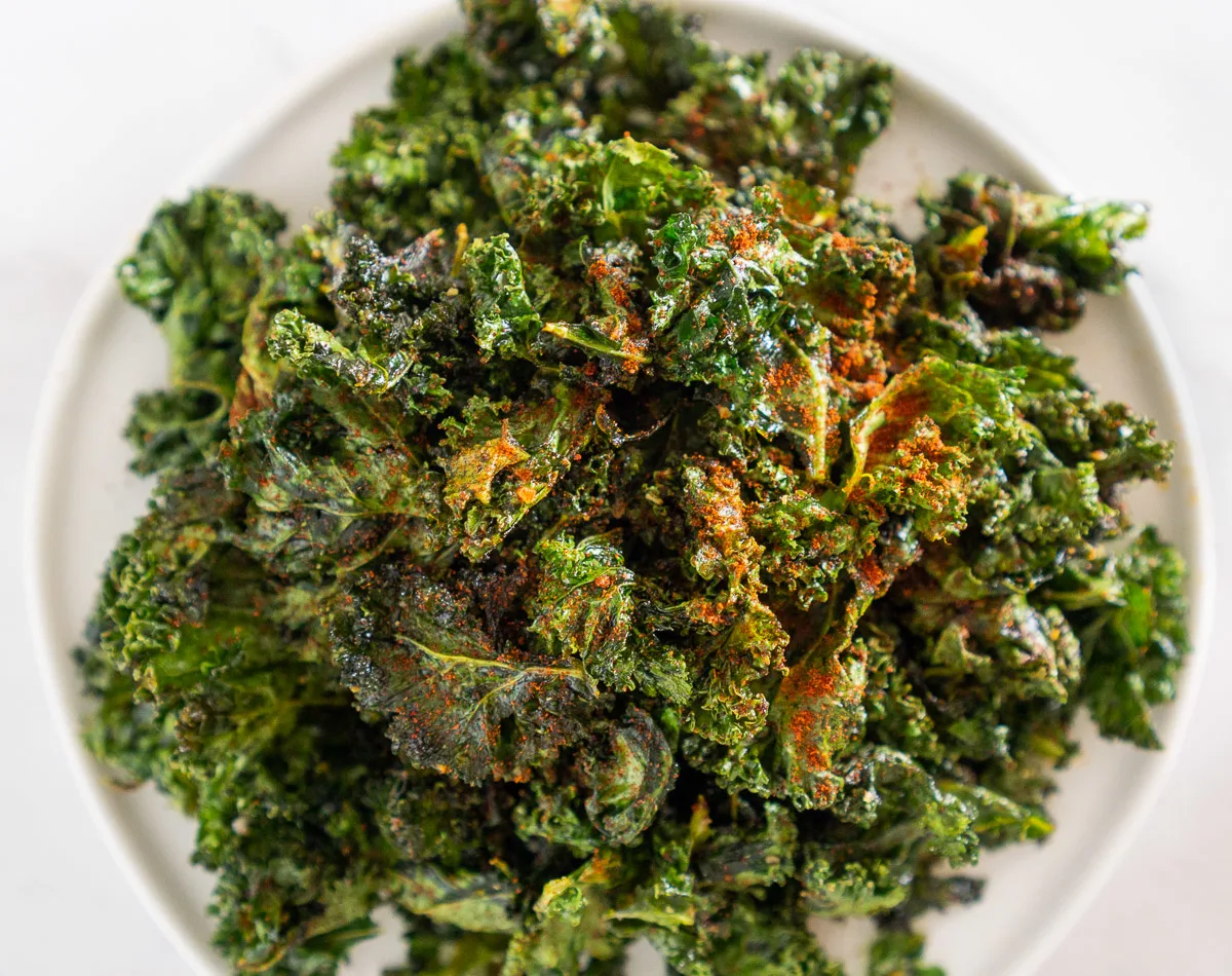 cajun spiced kale chips on a plate