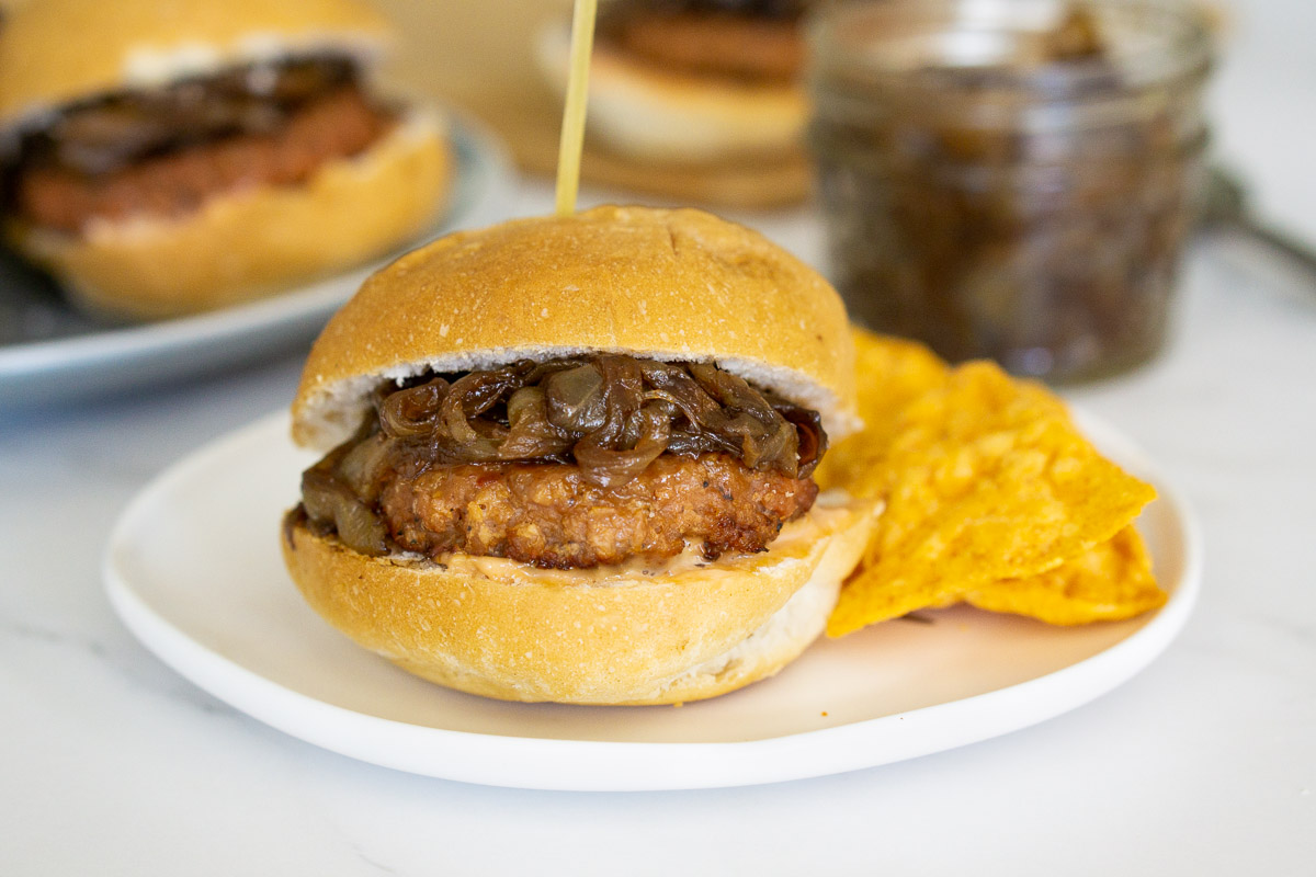 sausage caramelized onion sliders on a plate