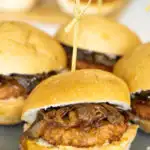 caramelized onion sausage sliders on a plate