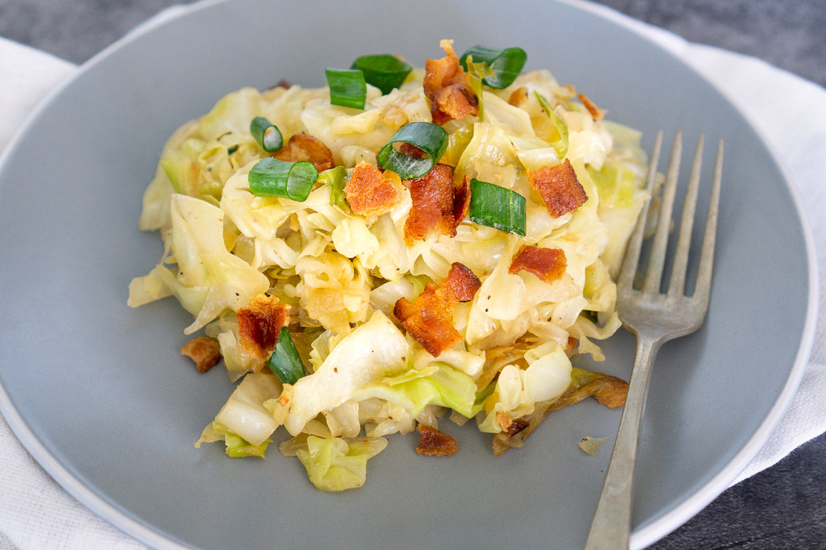 sauteed cabbage and bacon on a plate
