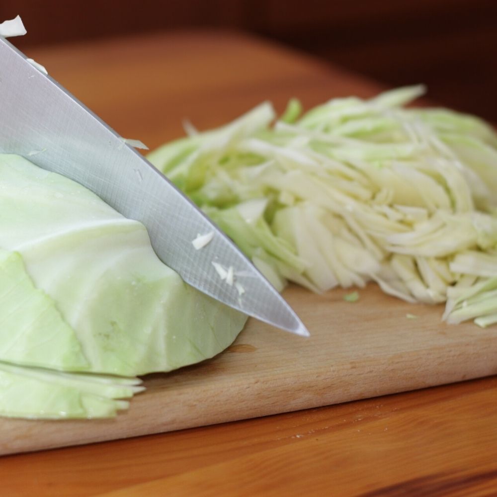 sliced cabbage on a cutting board