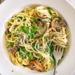 creamy mushroom pasta with spinach on a plate