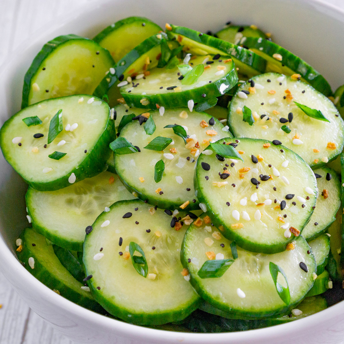 sesame cucumber salad with everything bagel seasoning in a bowl