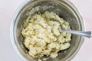 mashed potato and flour mixture in a bowl