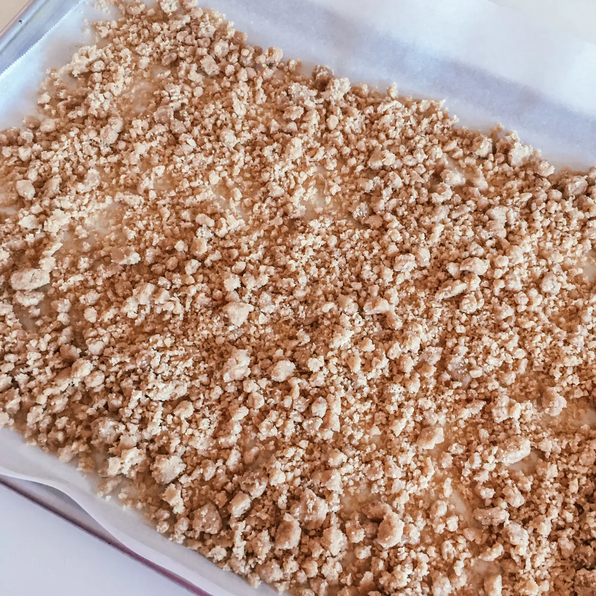 cinnamon crumb topping for muffins on a baking sheet