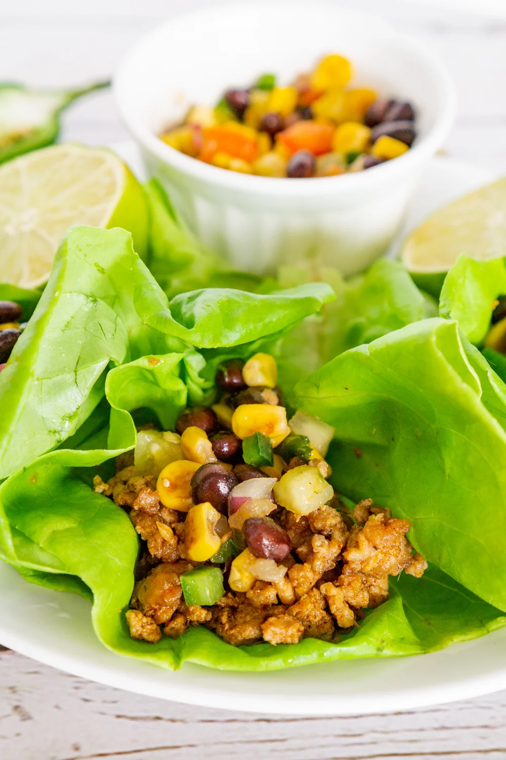 low carb ground pork tacos in lettuce leaves
