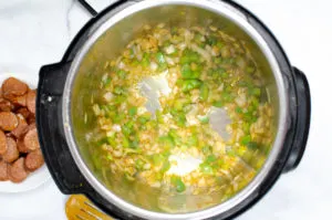bell pepper and onion sauteing in an instant pot