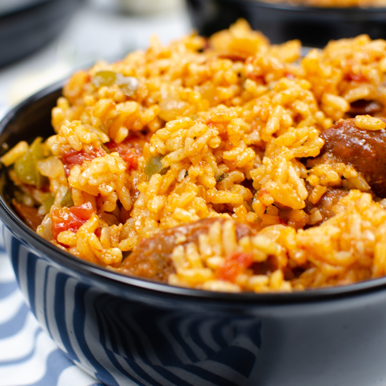 Creole Jambalaya with Andouille Sausage in a black bowl