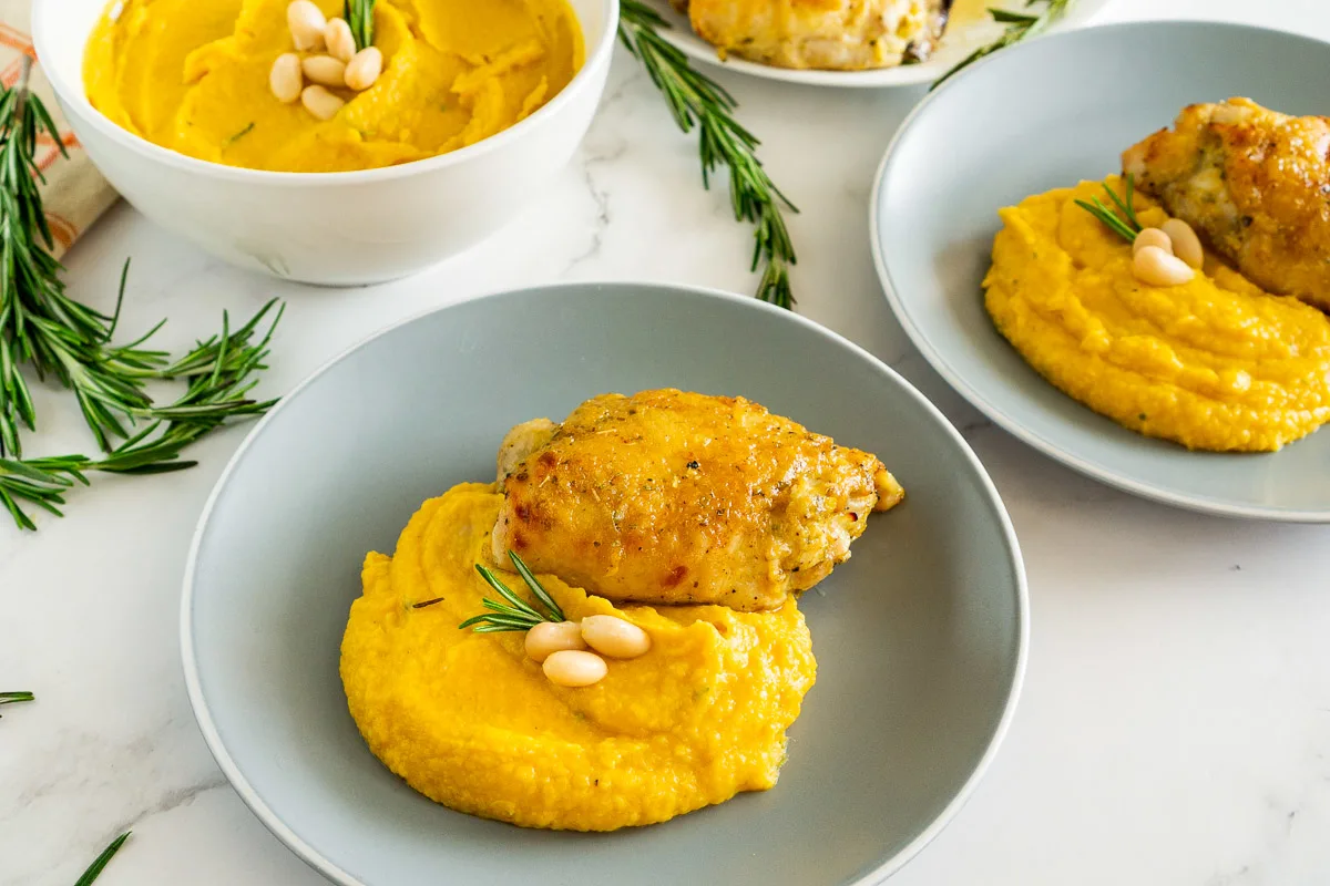 honey roasted chicken thighs with a side of pureed butternut squash and white bean mash