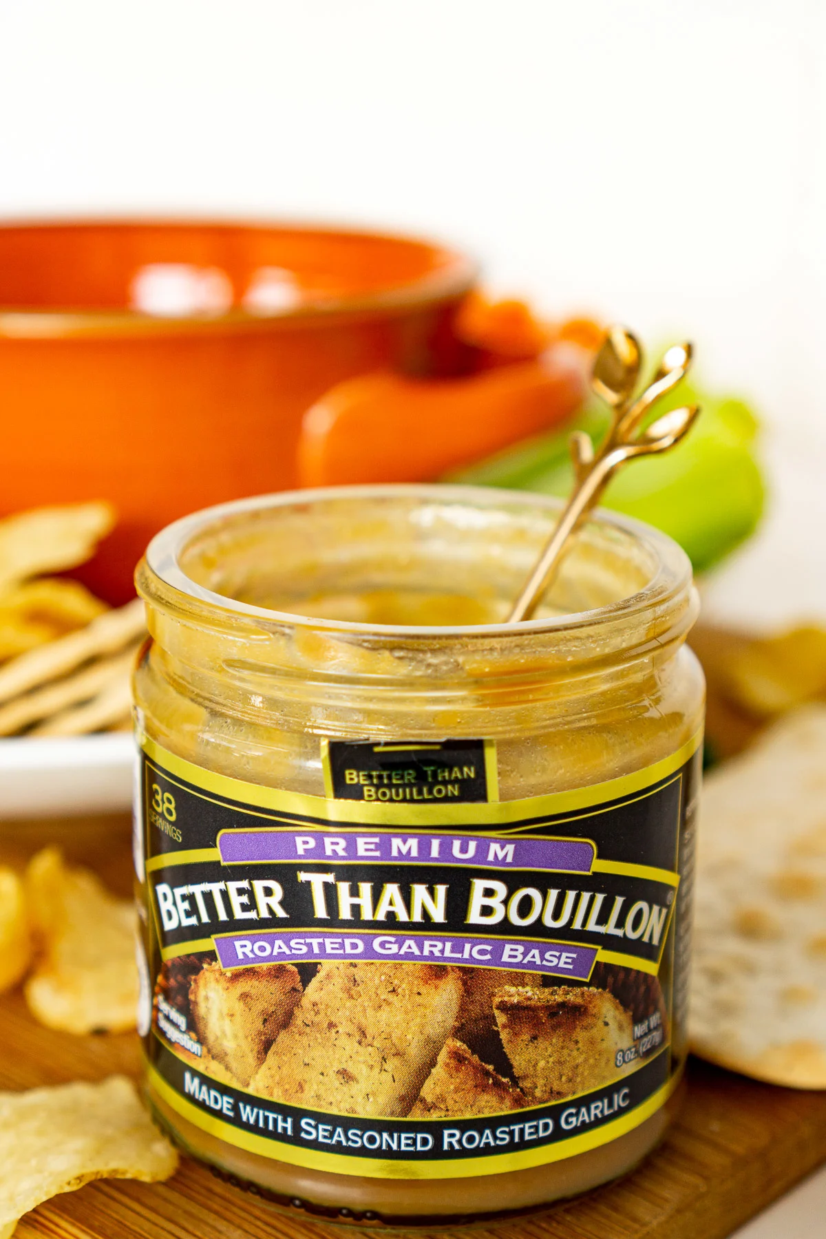 jar of better than bouillon roasted garlic base on an appetizer tray with a garlic dip