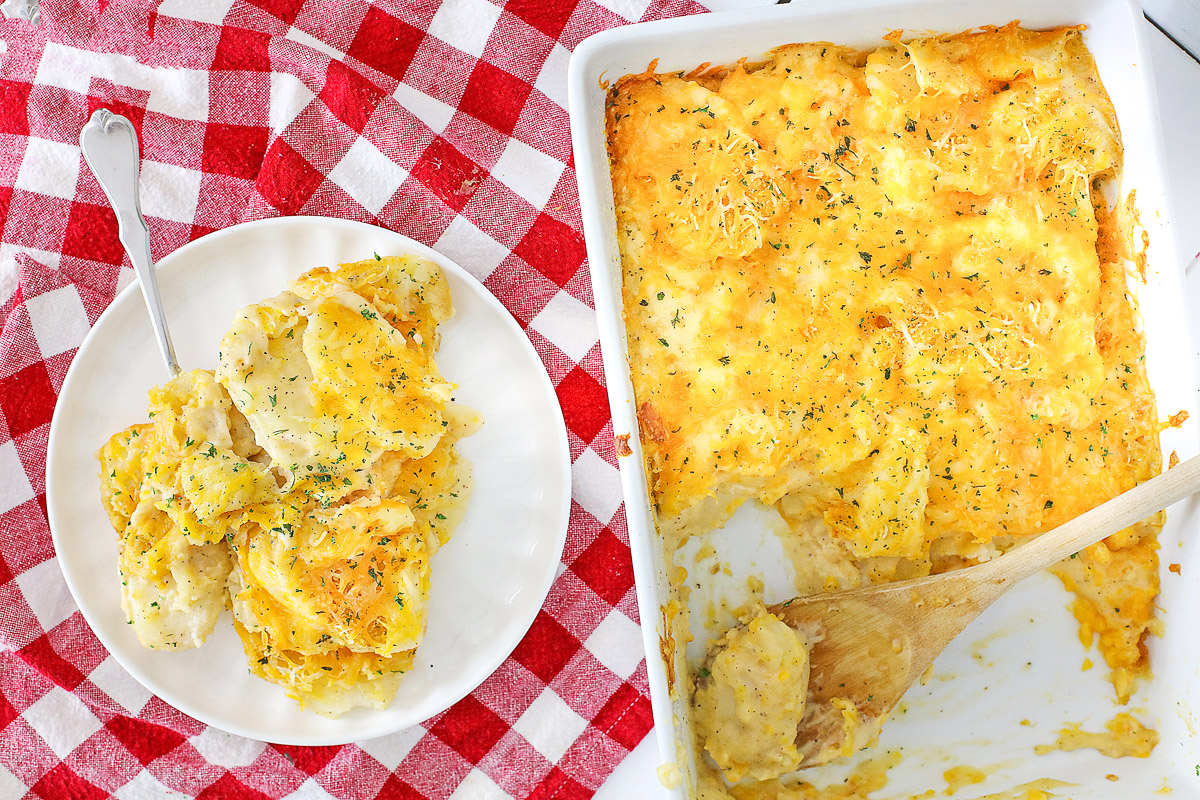 scalloped potatoes on a plate and in a casserole pan