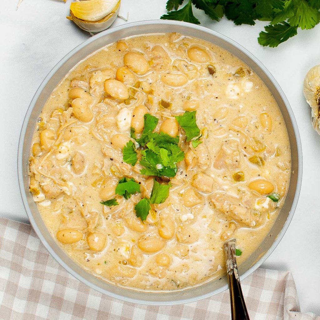 bowl of white chili with chicken made in the instant pot