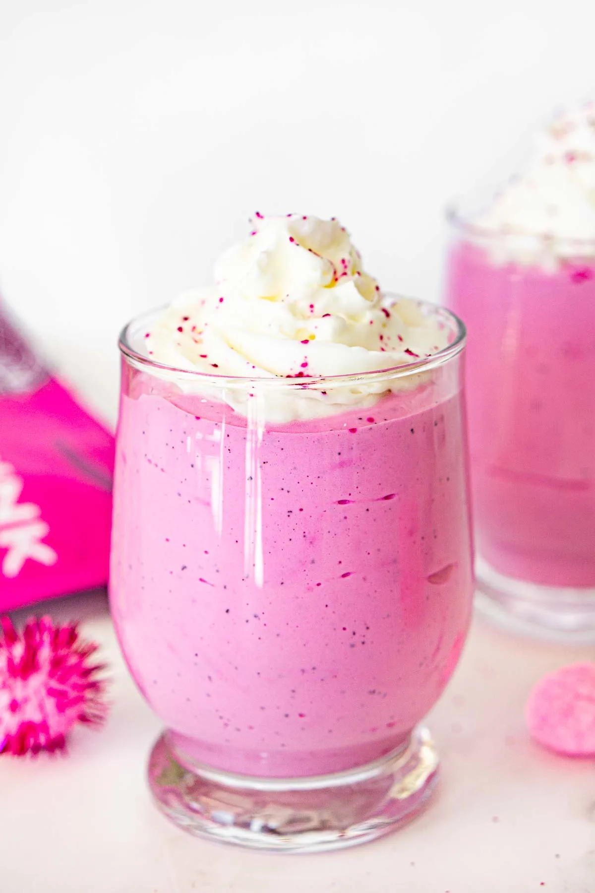 pink whipped cottage cheese dessert with whipped cream on top