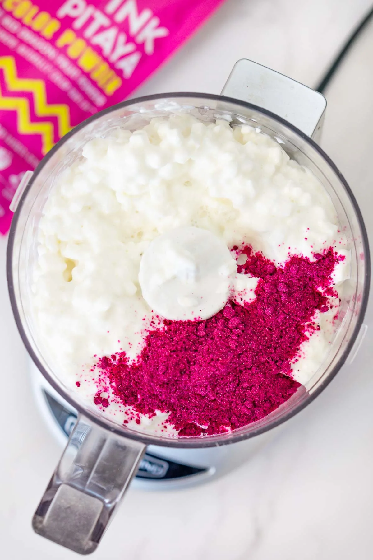 cottage cheese and dragon fruit powder in a food processor