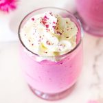 dragon fruit powder dessert with whipped cream on top