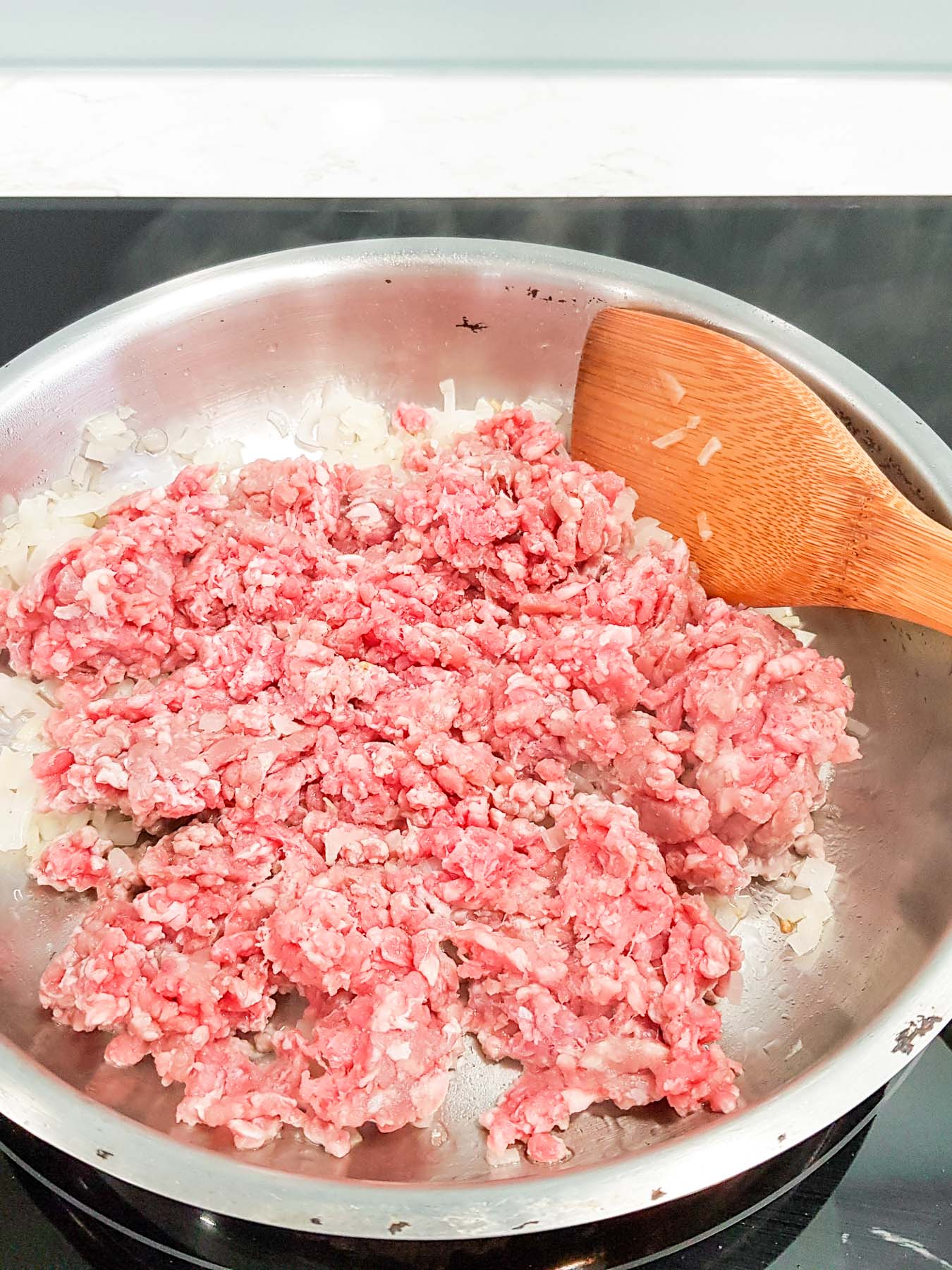 cooking ground beef in a skillet