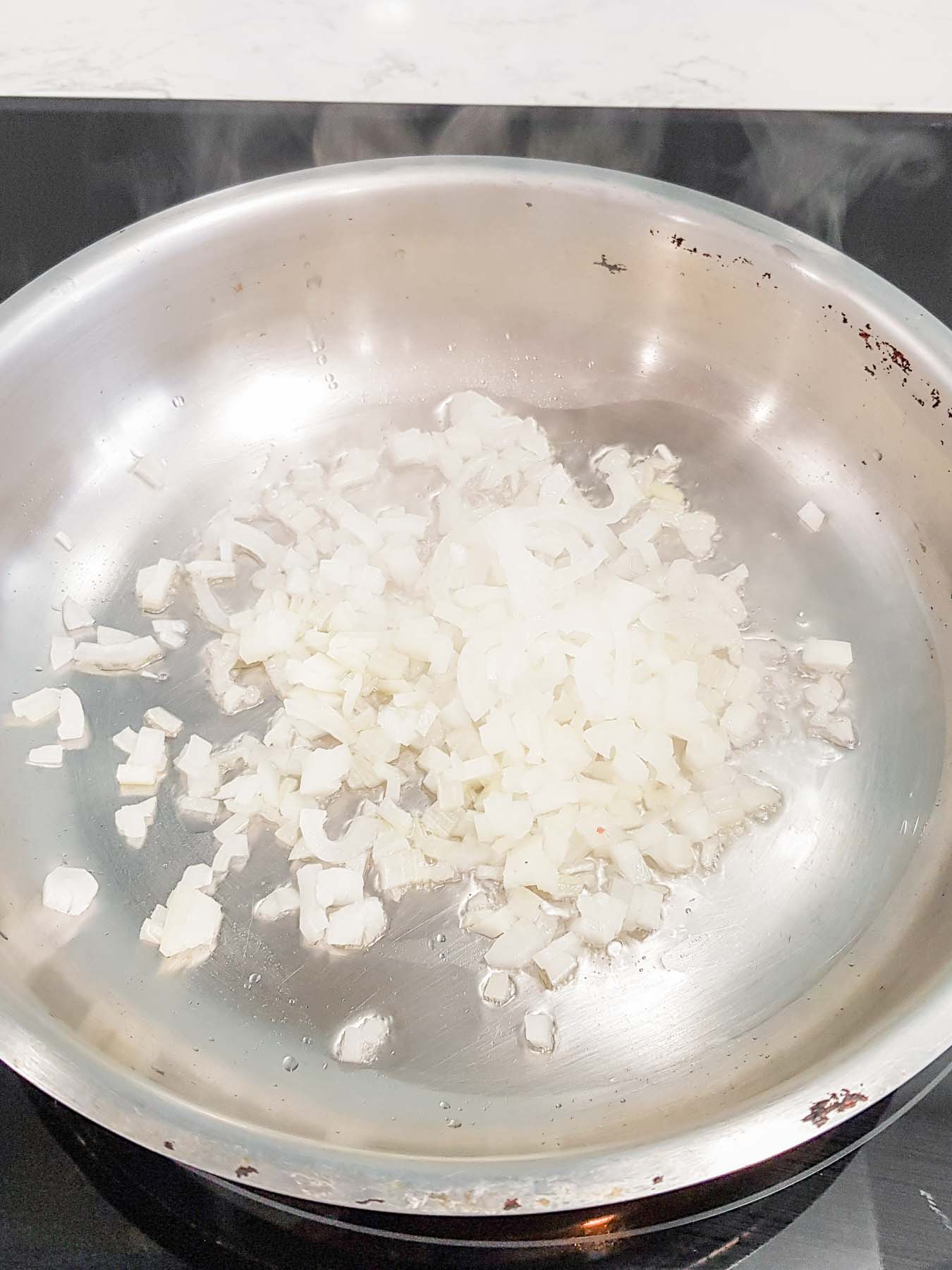 sautéing onion in a skillet
