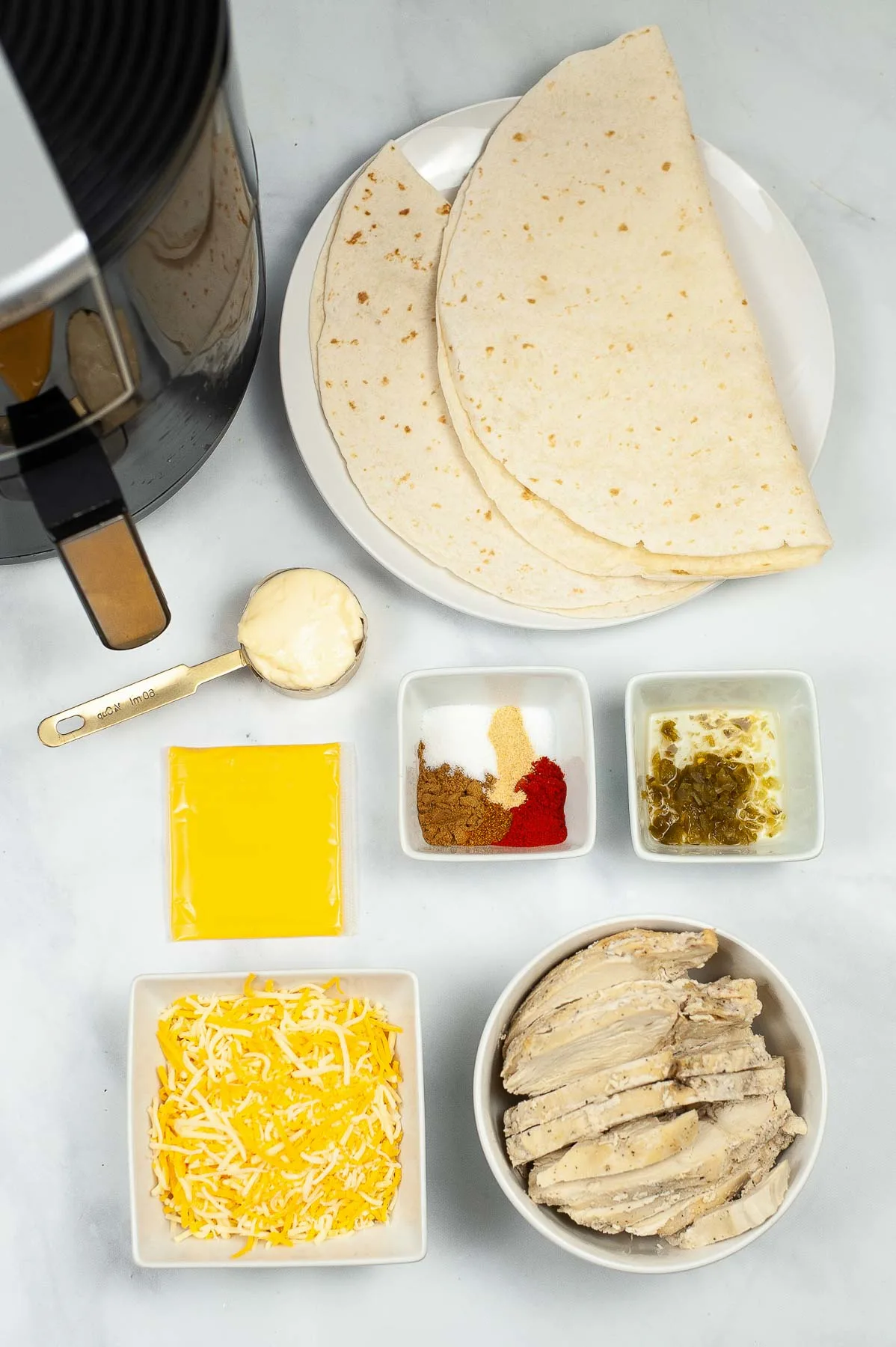 Ingredients for a copycat taco bell quesadilla recipe.