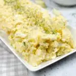 Potato salad made in the Instant Pot on a serving plate.
