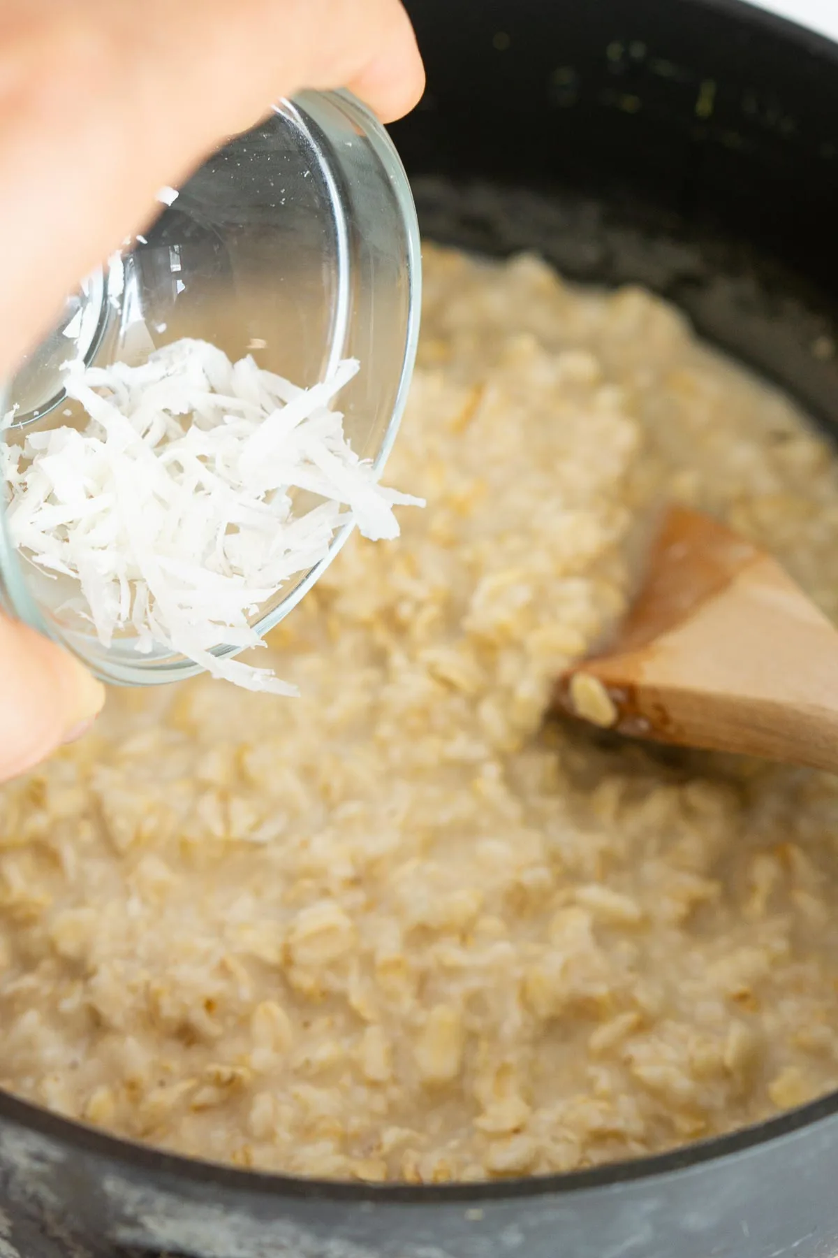 Adding Parmesan to oatmeal to make savory oatmeal.
