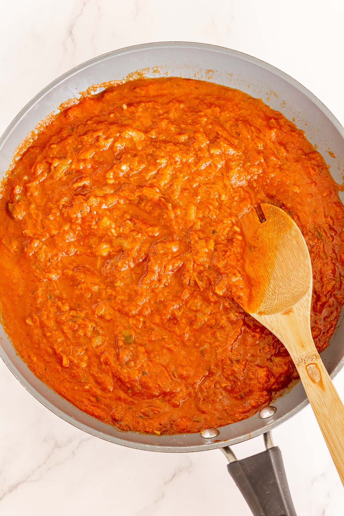 Spiced tomato sauce in a pan.