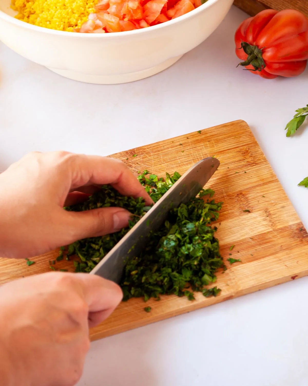 Chopping fresh parsley and mint.