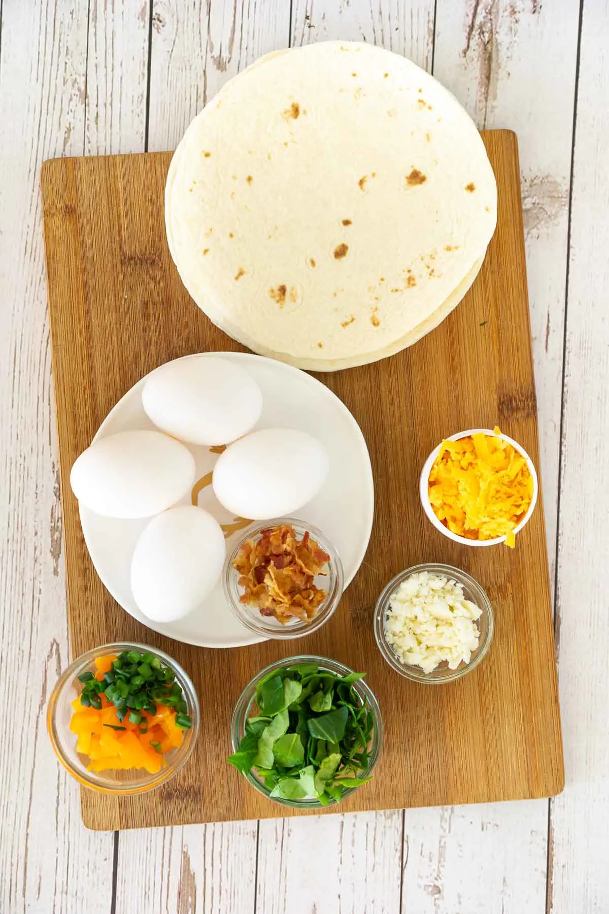 Ingredients to make tortilla egg skillet wraps.