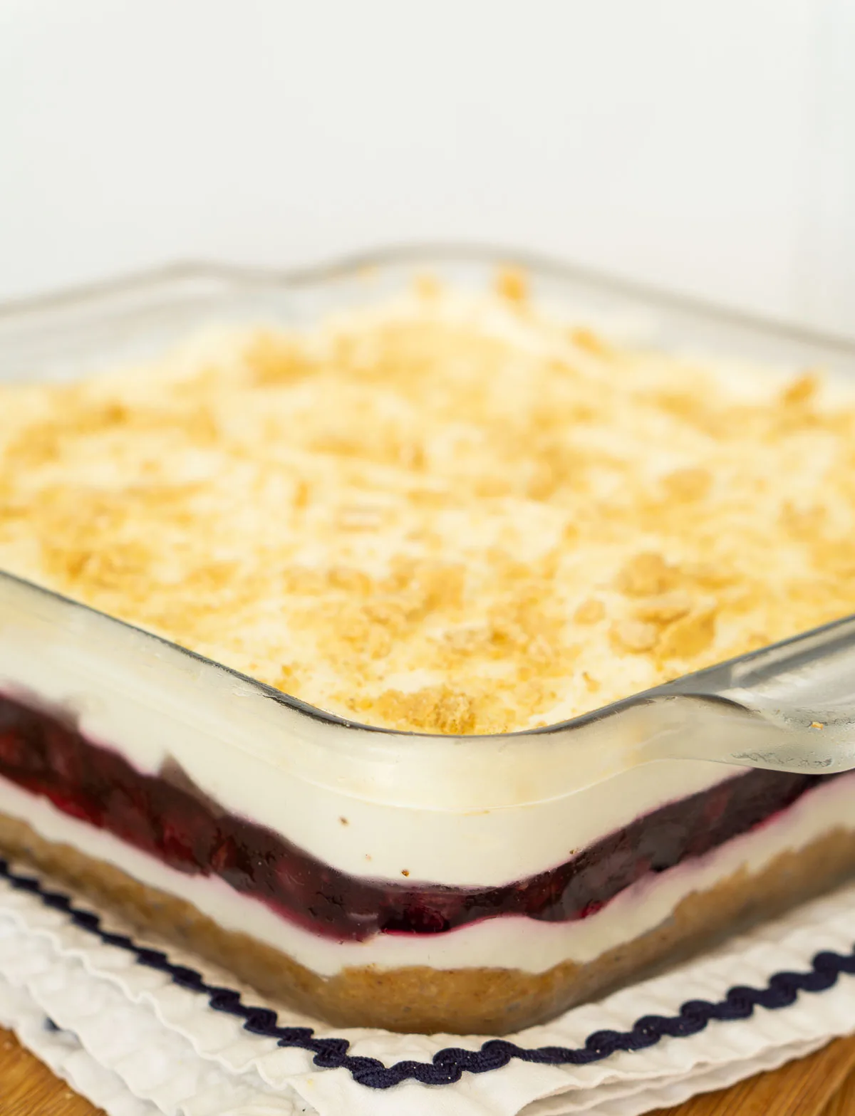 Blueberry delight no-bake blueberry dessert topped with graham cracker crumbs.