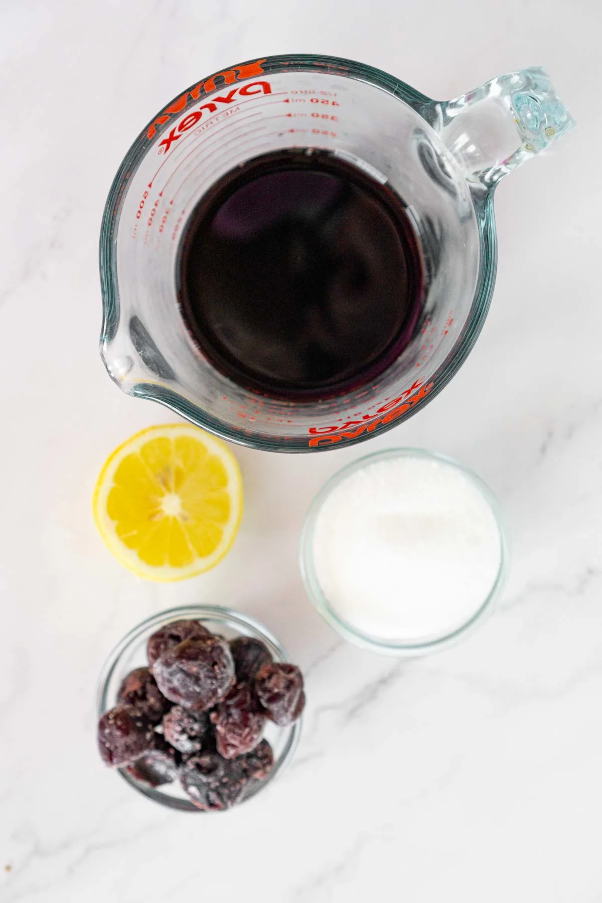 Ingredients to make cherry syrup: cherry juice, cherries, sugar, lemon juice.