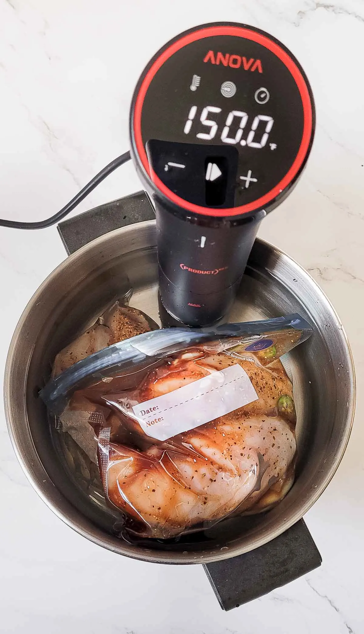 Making sous vide pulled chicken.