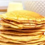 Pinnable image of eggnog pancakes.
