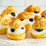 Lemon cream puffs with cream cheese filling and blueberries.
