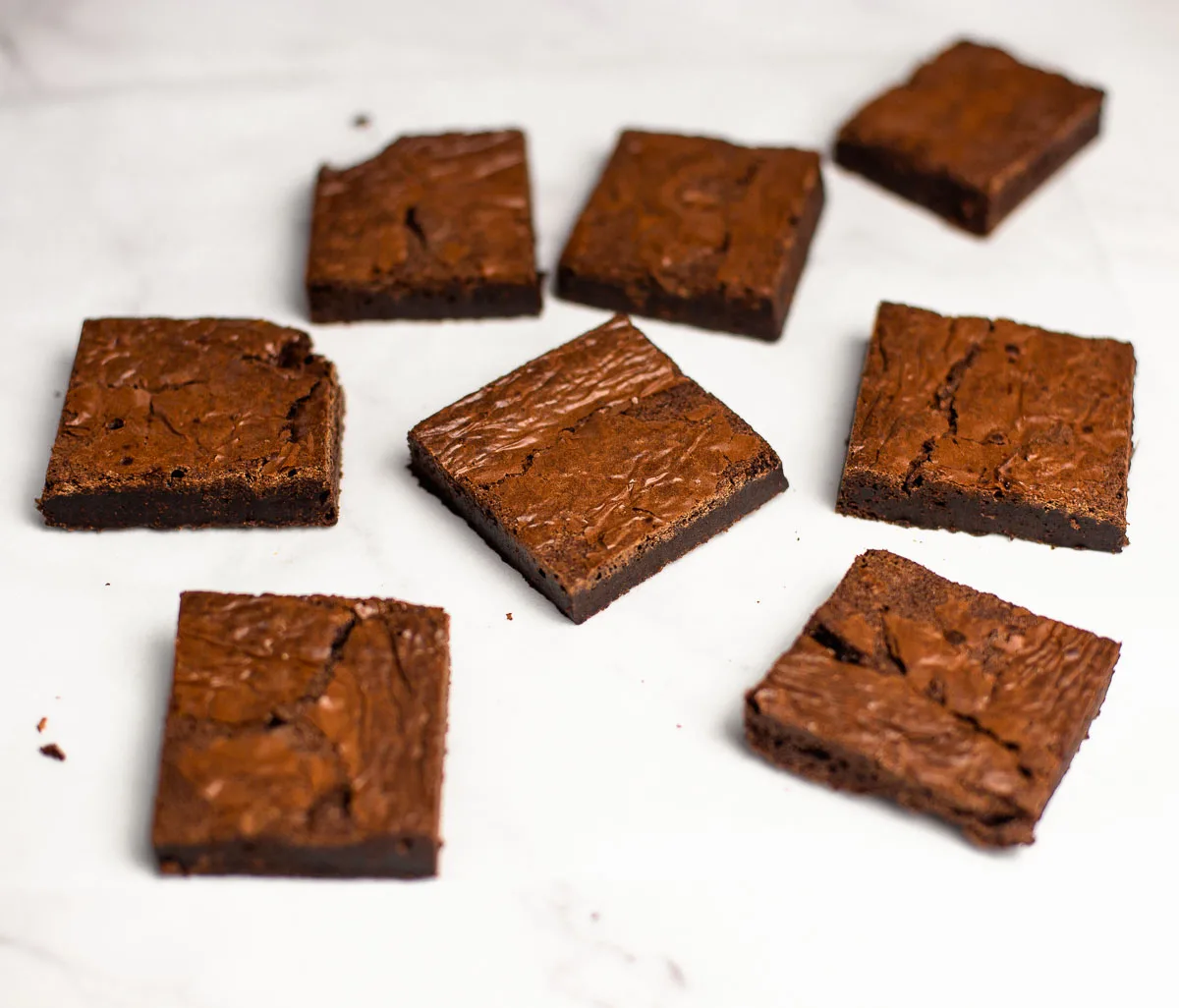 Brownie squares on parchment paper