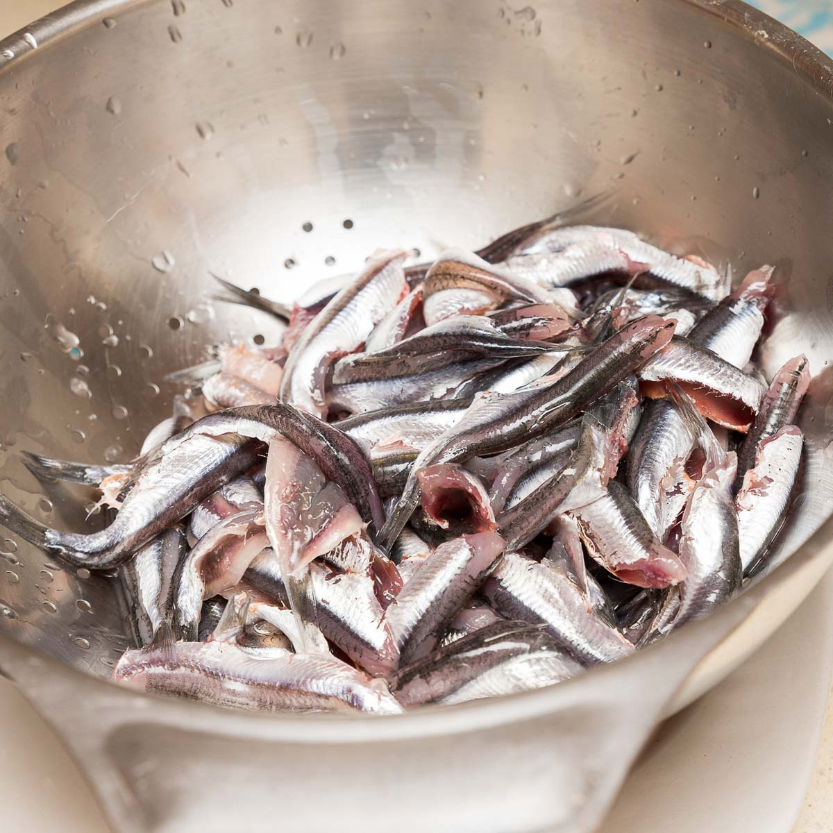 Cleaned fresh anchovies in a bowl