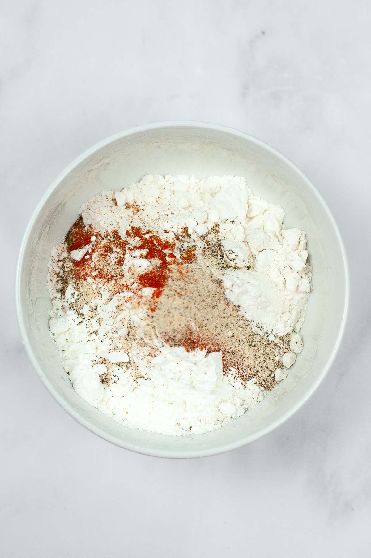Flour and seasonings in a bowl