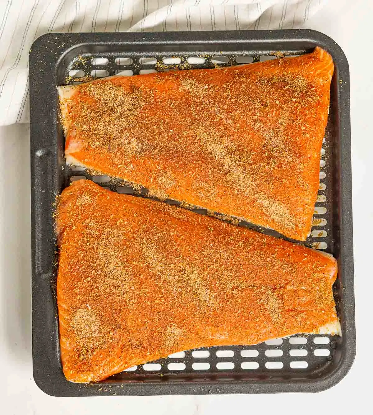 Taco seasoned trout on an air fryer tray