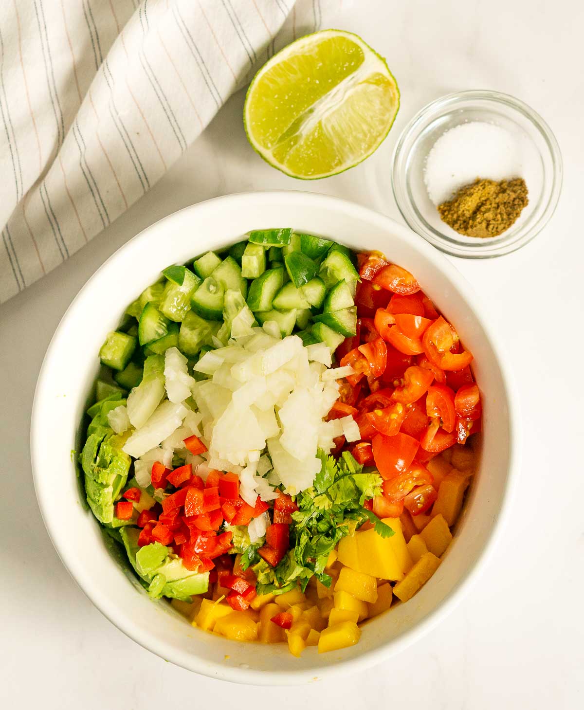 Ingredients for mango salsa in a bowl