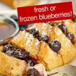 Pinterest image with text: Hasselback baguette French toast - fresh or frozen blueberries