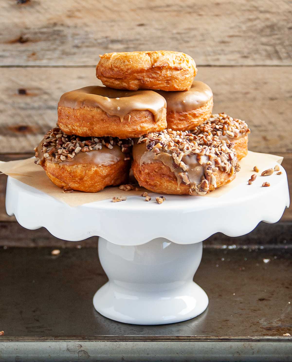 Biscuit donuts on a cake platter
