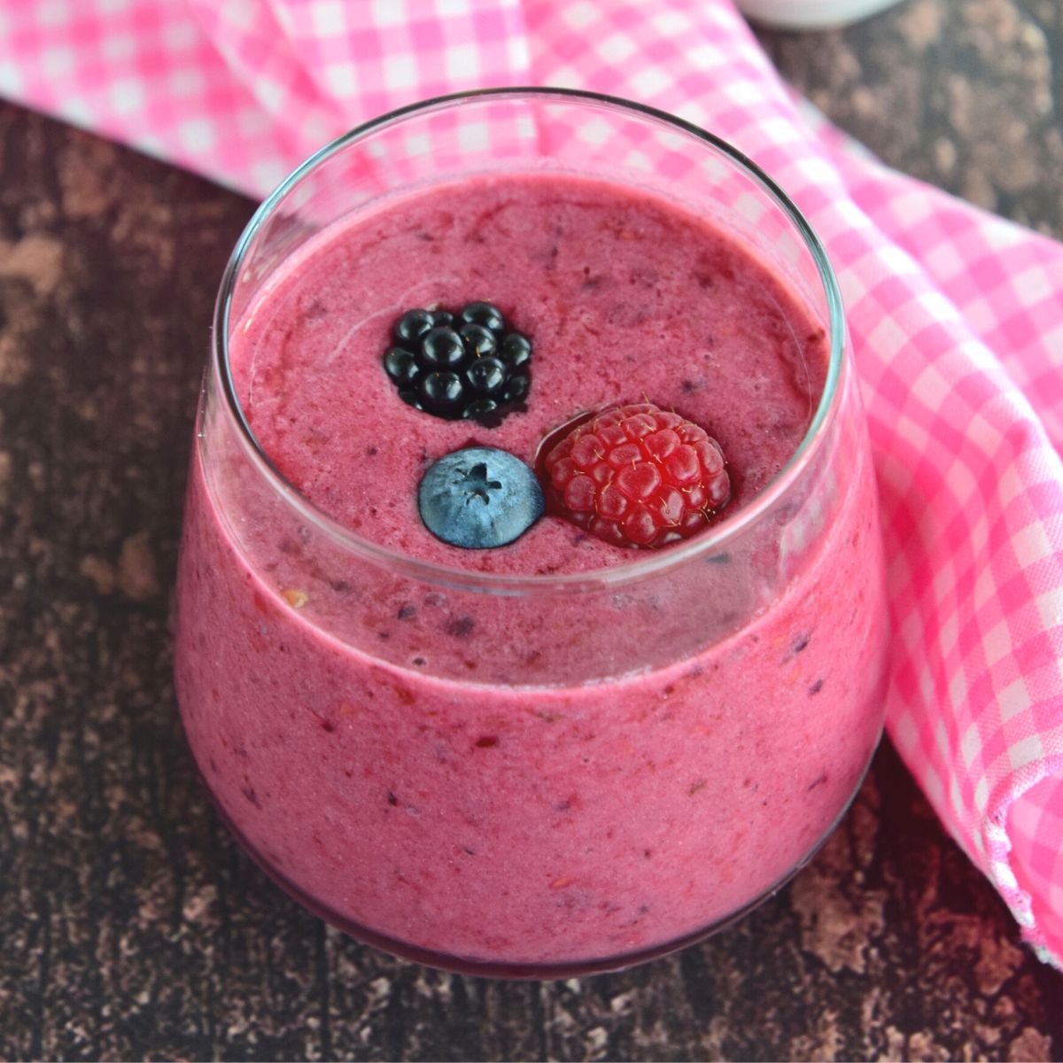 Mixed berry buttermilk smoothie in a cup