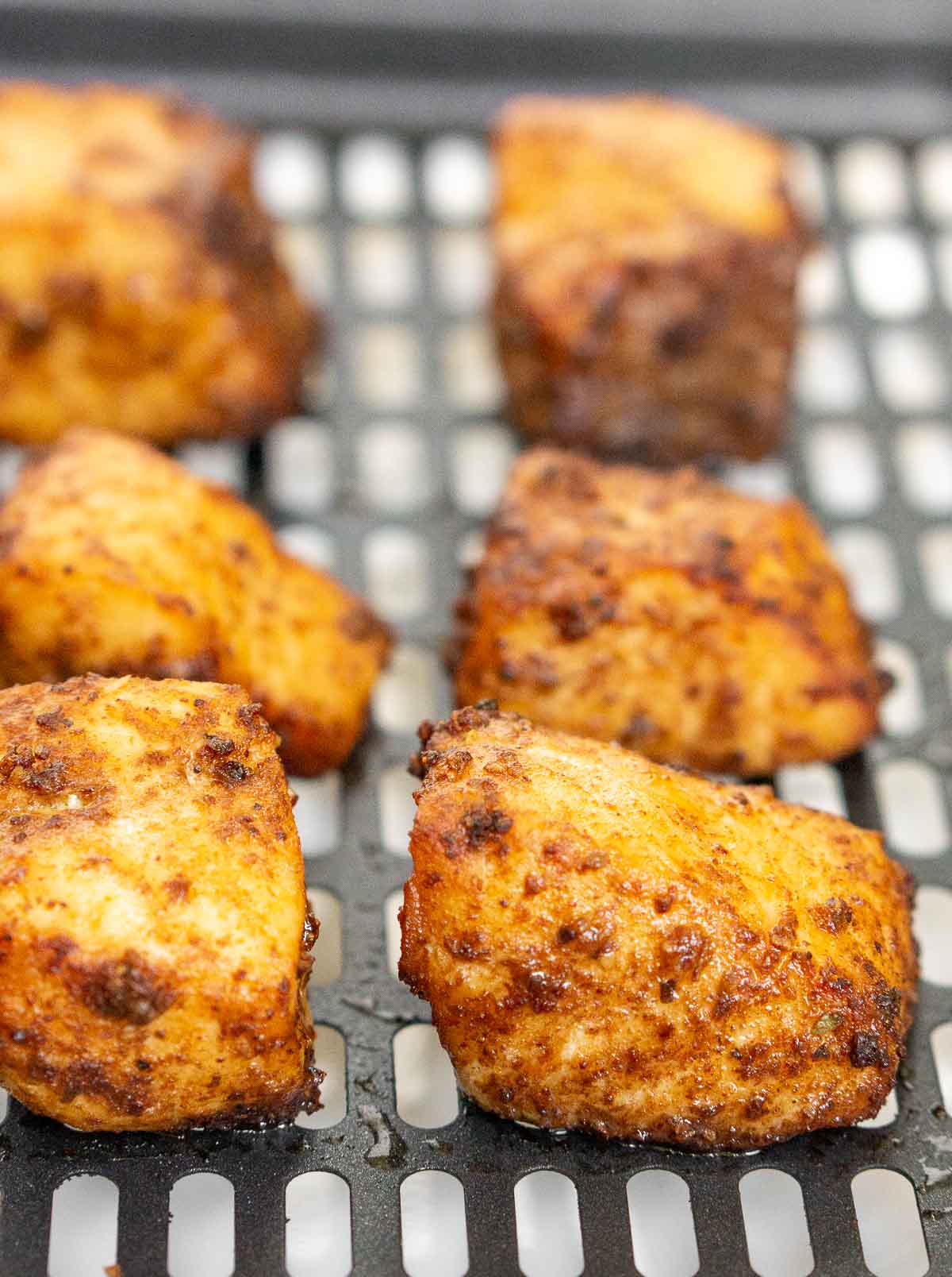 Air fryer cooked salmon bites close up