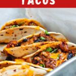 Pinterest image with text: Baked turkey tacos - feeds a crowd