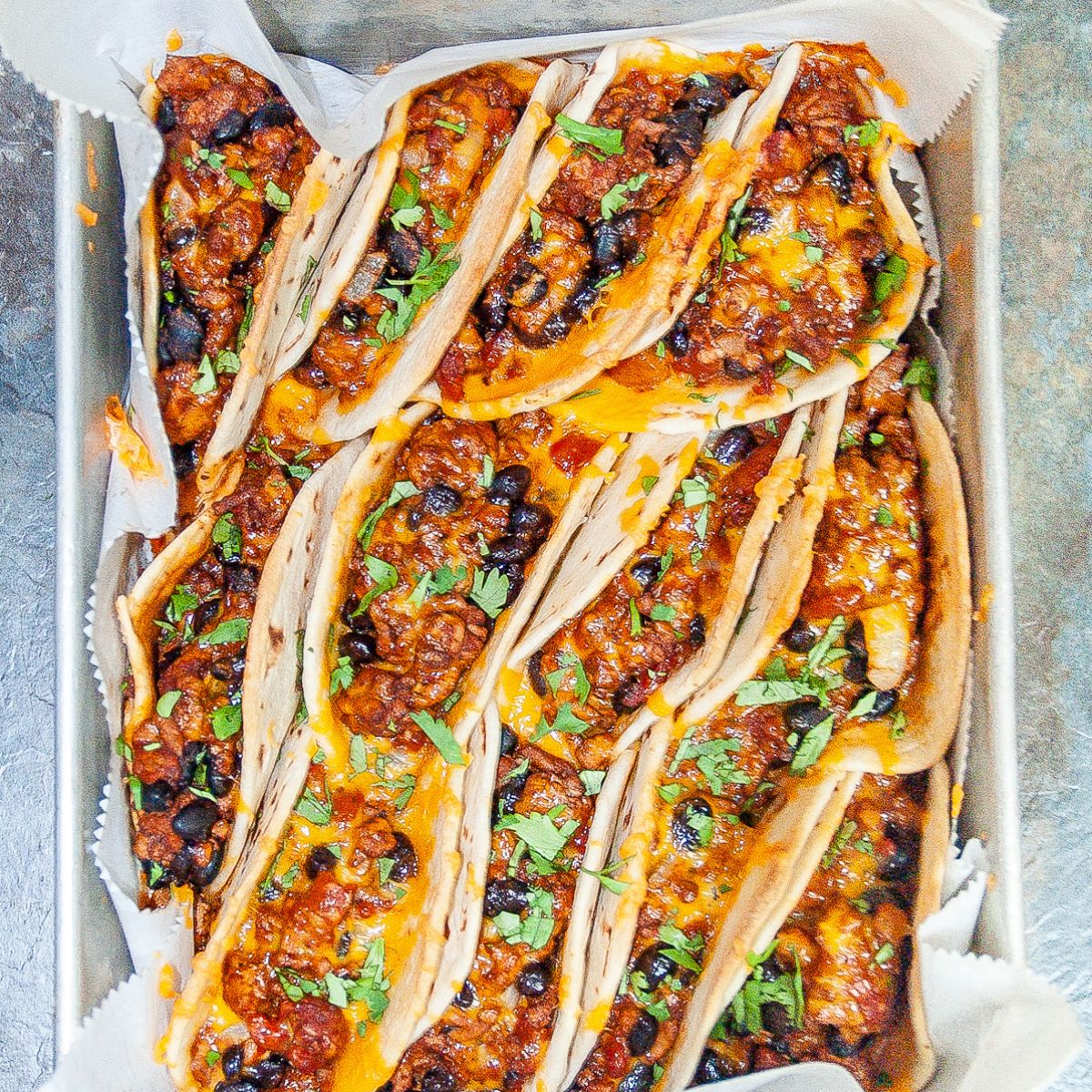 Baked tacos in a baking pan