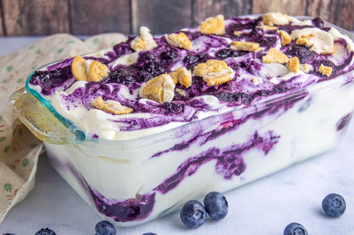 Blueberry swirl cheesecake ice cream in a loaf pan